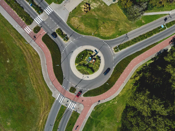 Top view drone aerial of roundabout with cycle lane, The Netherlands Shot with Dji Mavic Air. netherlands aerial stock pictures, royalty-free photos & images