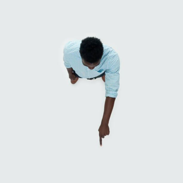 istock Caucasian male standing in front of white background 1209148398