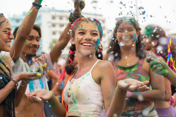 istock Rain of confetti at street carnival 1209149763