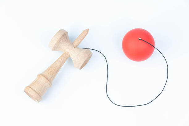 Kendama on white background Kendama(Cup-and-ball Toy) is a traditional japanese wood toy kendama traditional japanese toy stock pictures, royalty-free photos & images