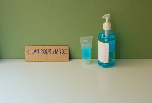 CLEAN YOUR HANDS cardboard sign stock photo