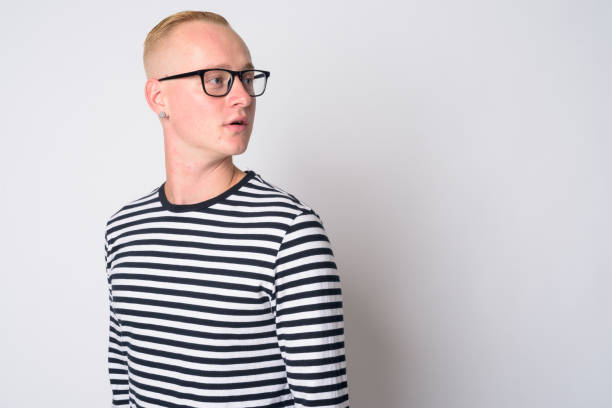 istock Face of young handsome blonde man thinking and looking back 1209161694