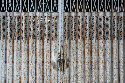 Closeup of a metal gate typically found on buildings