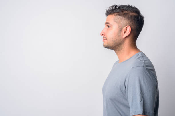 istock Closeup profile view of young handsome Persian man 1209164091