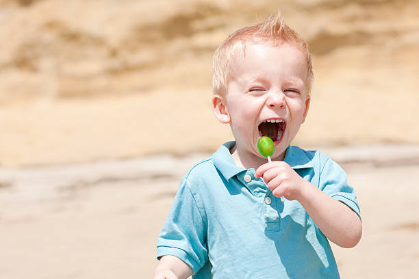 istock Child Taking a Big lick on his lollipop 120917182