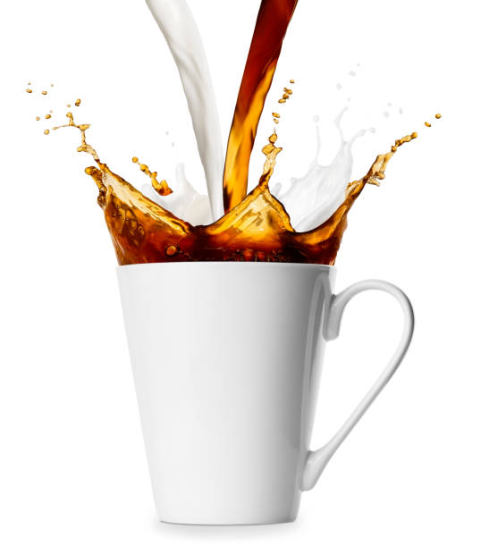 istock cup with coffee and milk splashes 1209173176