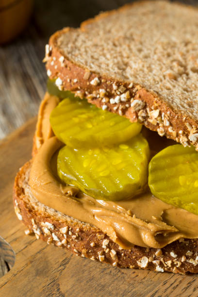 istock Homemade Peanut Butter and Pickle Sandwich 1209175031
