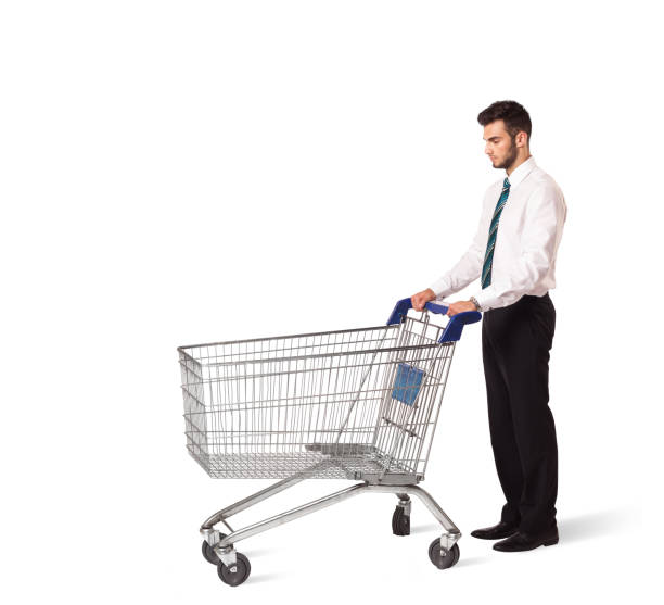 istock Businessman with shopping cart 1209177759
