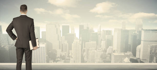 istock Businessman with city view 1209177938