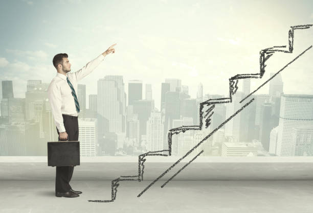 istock Business man climbing up on hand drawn staircase concept 1209179625
