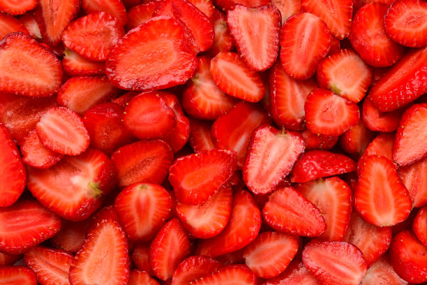 istock Strawberry slices. Fresh berries macro. Fruit background. Top view. 1209179822