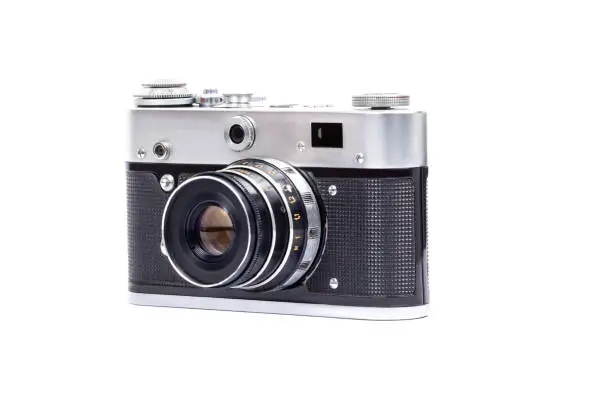 Vintage camera on a white background, retro photo camera isolated