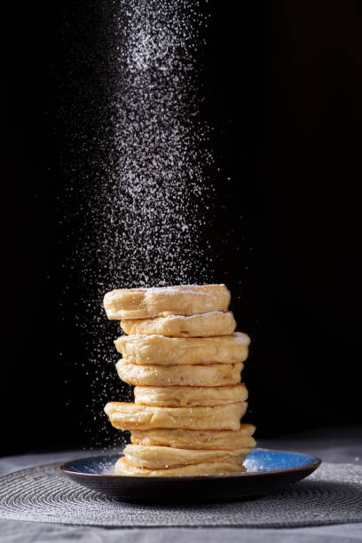 istock stack of pancakes powdered with sugar powder 1209182035