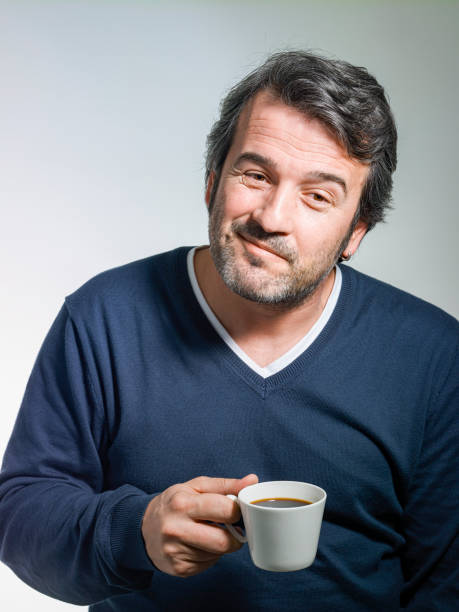 istock Happy mature man drinking coffee 1209182377