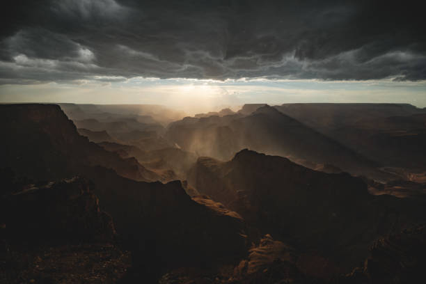 istock Dramatic rain storm clouds above the Grand Canyon Valley 1209184531