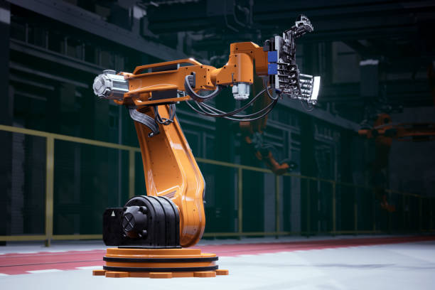 Orange robot in a factory 3d illustration of industrial robot industrial orange stock pictures, royalty-free photos & images