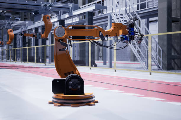 istock Orange robot in a factory 1209185668