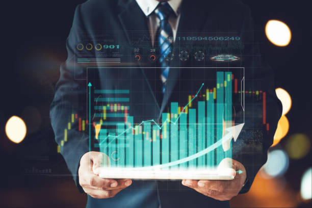 istock businessman white suit present information chart of stock 1209185695