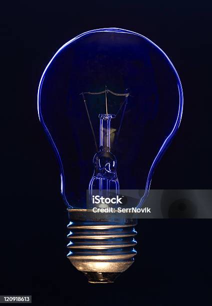 Light Bulb Stock Photo - Download Image Now - Black Background, Black Color, Blue