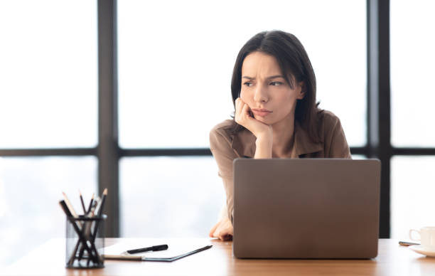 istock European young manager looking away at work place 1209187537