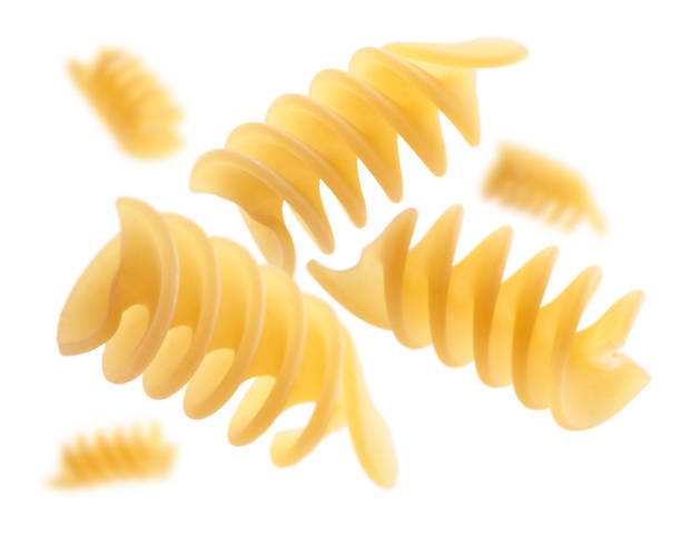 istock Italian pasta levitating on a white background 1209191175