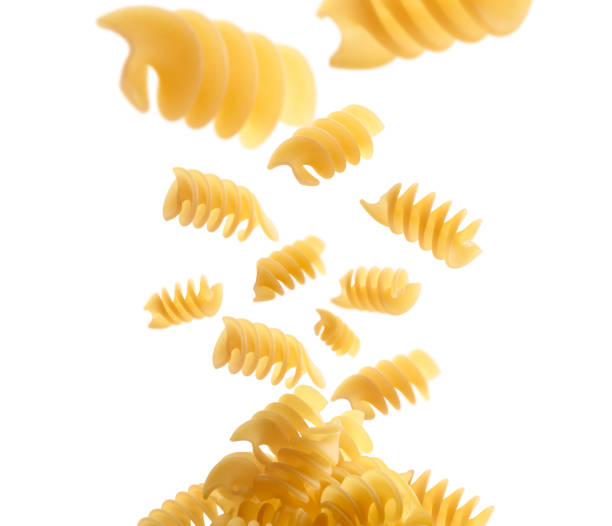 istock Italian pasta levitating on a white background 1209191181