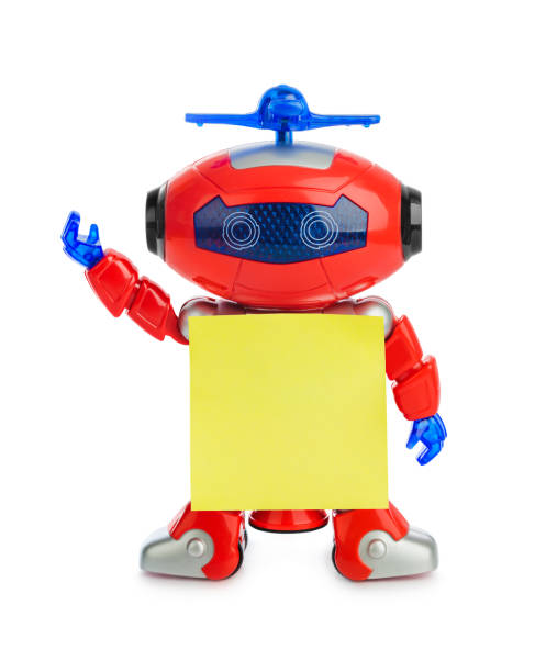 istock Toy robot with blank paper 1209197028
