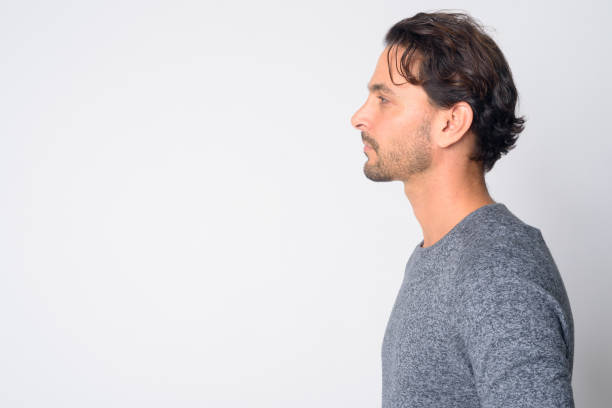 istock Closeup profile view of handsome Hispanic man 1209197062