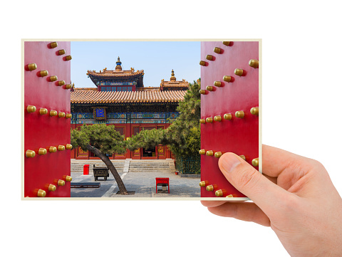 Hand and Lama Yonghe Temple in Beijing China (my photo) isolated on white background