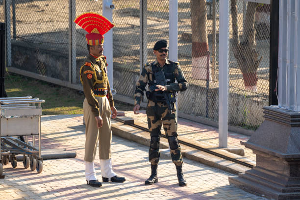 Attari, India - February 8, 2020: Indian Border Security Force members talk before the Wagah Border Closing ceremony with Pakistan