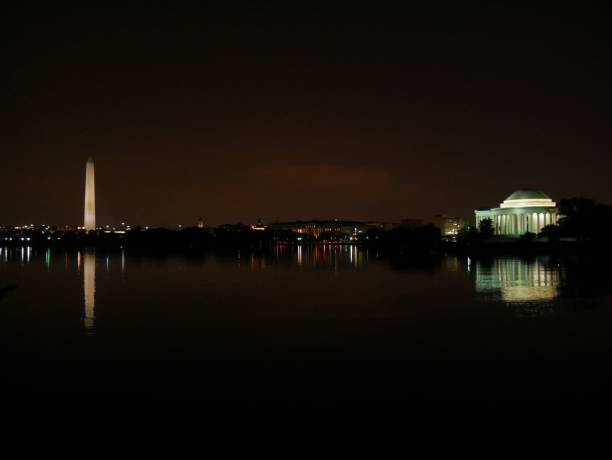 istock The Washington Monument and Thomas Jeffersion Memorial building reflected in the waters of Potomac River. 1209202260