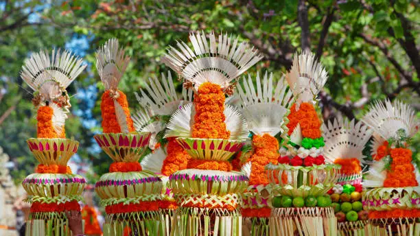 Traditional Balinese offering for gods, spirits of Bali island. Used at ceremonies on Galungan celebration, Melasti and silence day Nyepi. Holiday festivals, rituals, culture of Indonesian people.