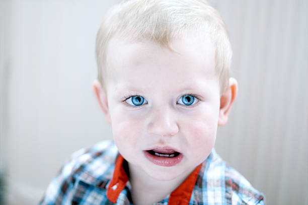 istock Unhappy Little Boy with Big Blue Eyes 120920516