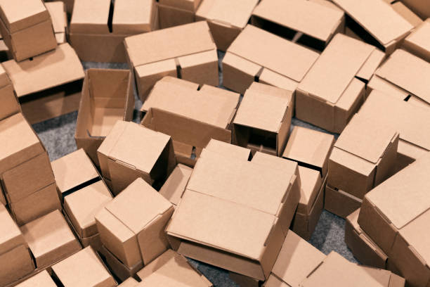 istock pile of empty cardboard boxes for recycling 1209206562