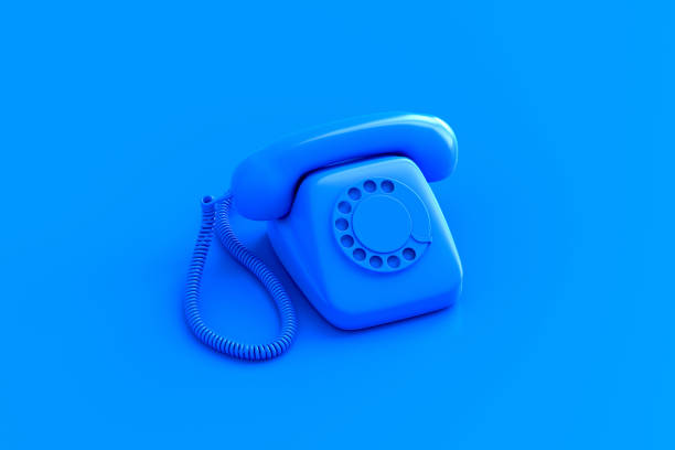 istock Blue retro rotary dial telephone on color background 1209207179