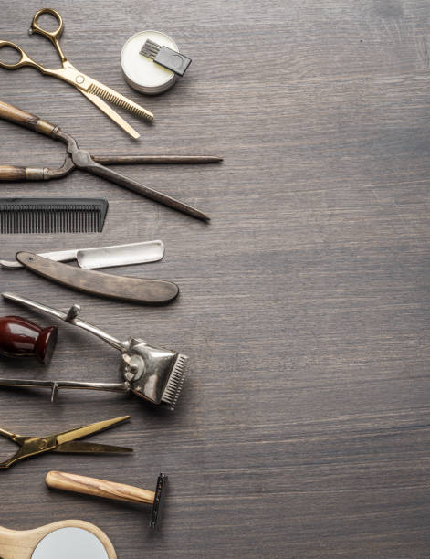 istock Classic grooming and hairdressing tools on wooden background. 1209207993