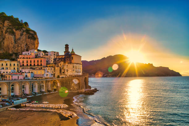 Atrani - Amalfi coast - Italy Sunrise over the famous village of Atrani on the Amalfi coast. Many of the small villages along the Amalfi coastline are hundreds of meters above sea level, because of the geographical reasons. The Amalfi coast is a stretch of coastline on the northern coast of the Salerno Gulf on the Tyrrhenian Sea, located in the Province of Salerno of southern Italy. The Amalfi Coast is a popular tourist destination for the region and Italy as a whole, attracting thousands of tourists annually. In 1997, the Amalfi Coast was listed as a UNESCO World Heritage Site. adriatic sea photos stock pictures, royalty-free photos & images