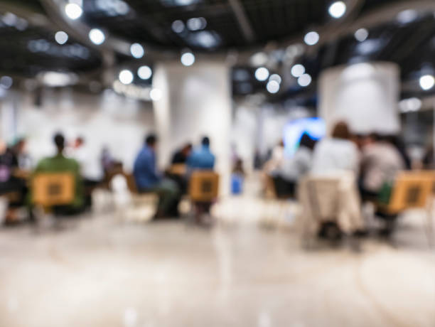istock People sitting indoor Shop cafe Blur background 1209219594