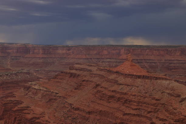 istock Ominous Dark Clouds at Dead Horse Point 1209220138