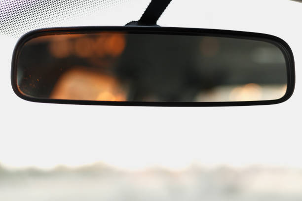 espejo retrovisor con luz naranja - rear view mirror car mirror sun fotografías e imágenes de stock