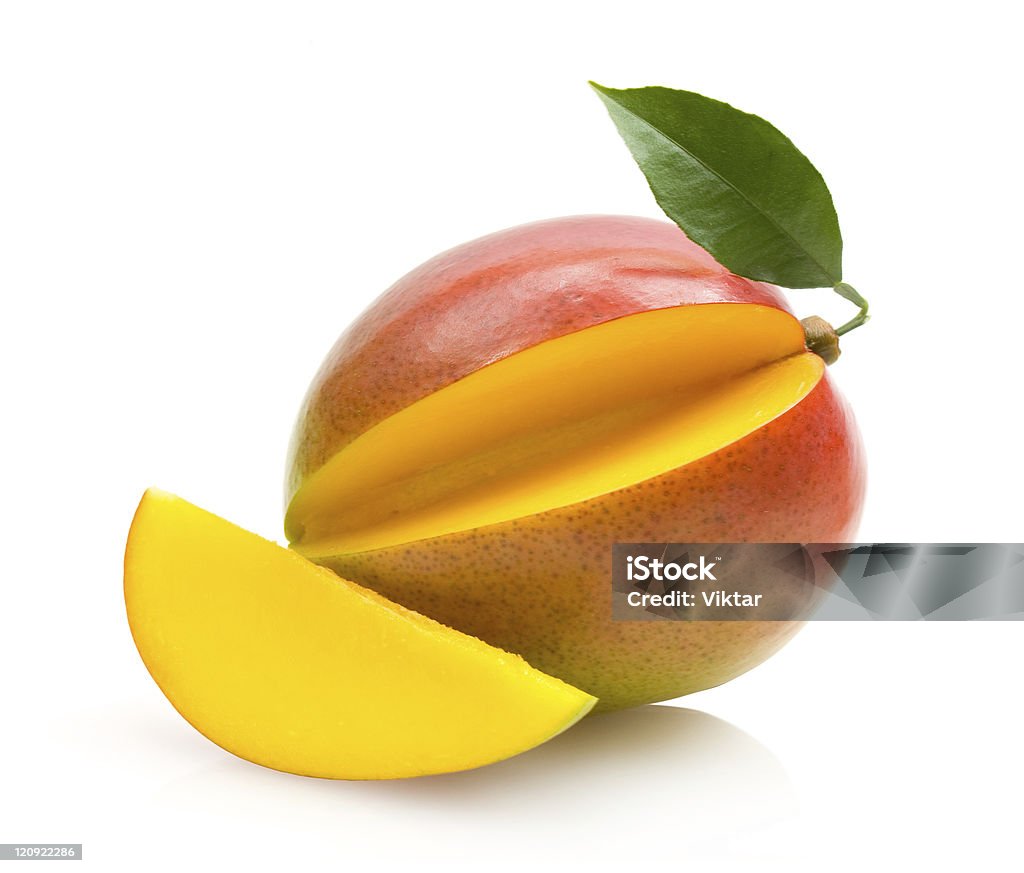 mango sliced mango with a leaf isolated on white background Color Image Stock Photo