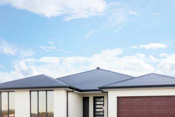 istock Copy space above a house with blue sky 1209223232