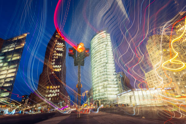 abstract view with blurred lights of Potsdamer Platz at dusk, Berlin, Germany