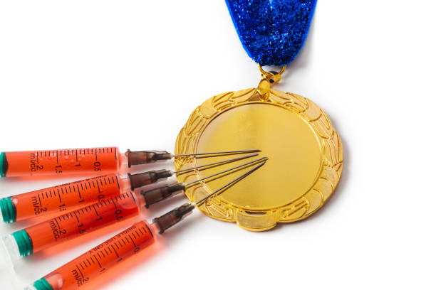 istock Gold medal and syringes 1209224855