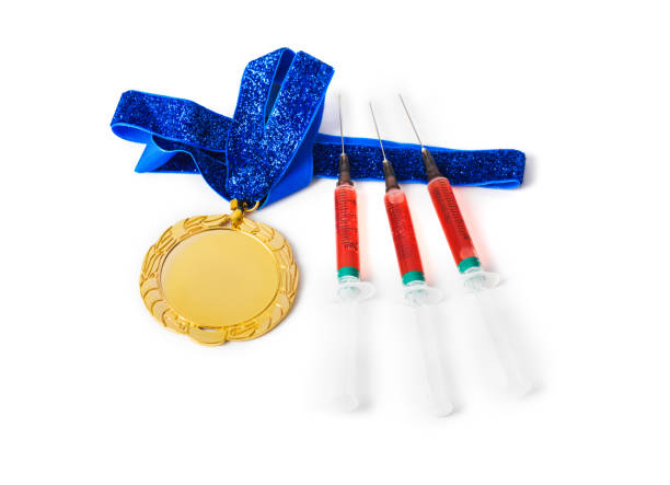 istock Gold medal and syringes 1209224862