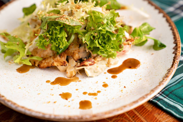 istock salad closeup. part a white plate. 1209224941