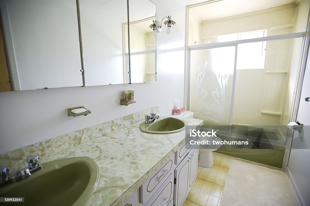 Old bathroom View of an old bathroom built in the seventies. Vertical Bathroom Stock Photo