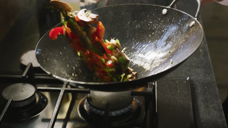 Chef cooking vegetables