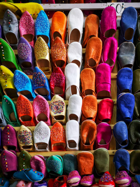 Traditional moroccan leather slippers in the local souk of old Medina (Old Town) in Marrakech, Morocco