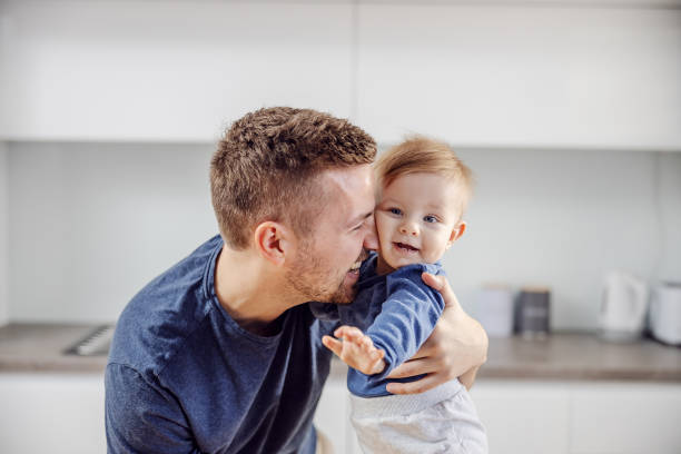 istock Young happy father hugging his adorable beloved son. 1209233686